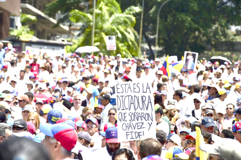 Venezuela: la oposición marcha  en silencio tras ola de disturbios